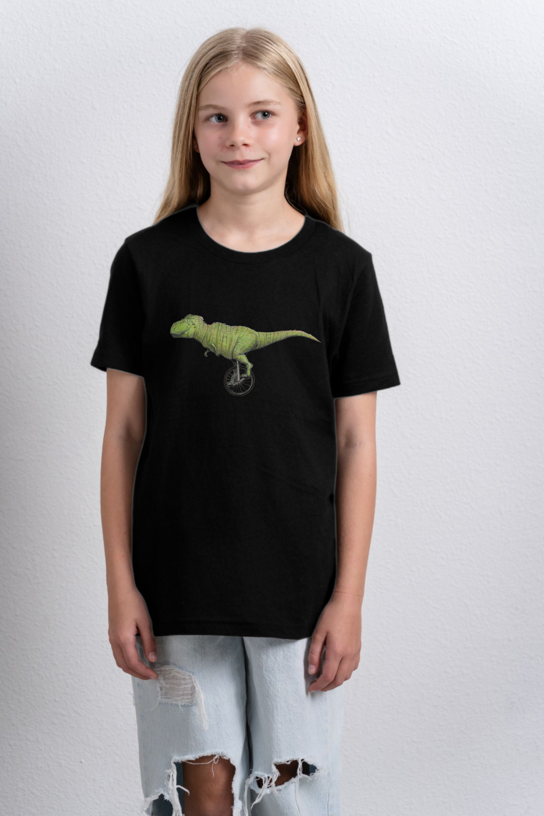 T-rex Unicycling organic cotton kids t-shirt